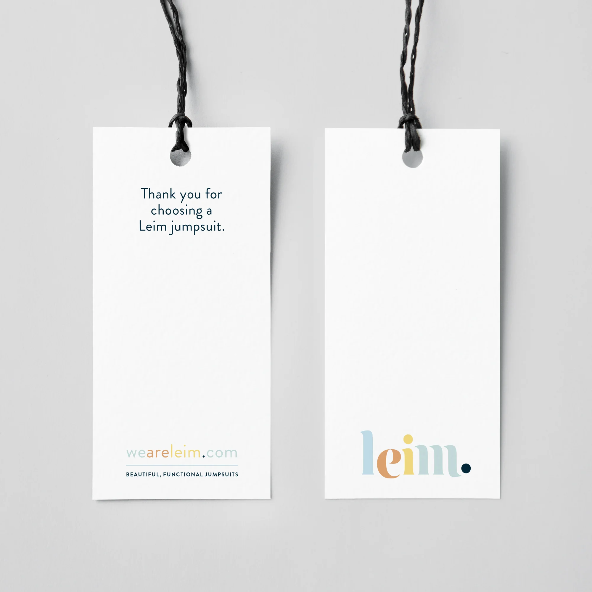 a mockup showing the front and back of Leim's swingtags designed by Petits Papiers